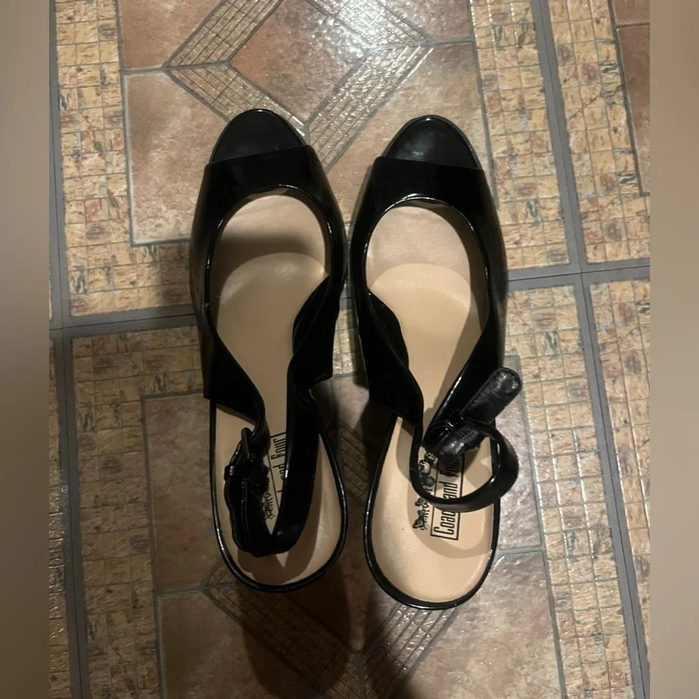 Coach and four Black heels
